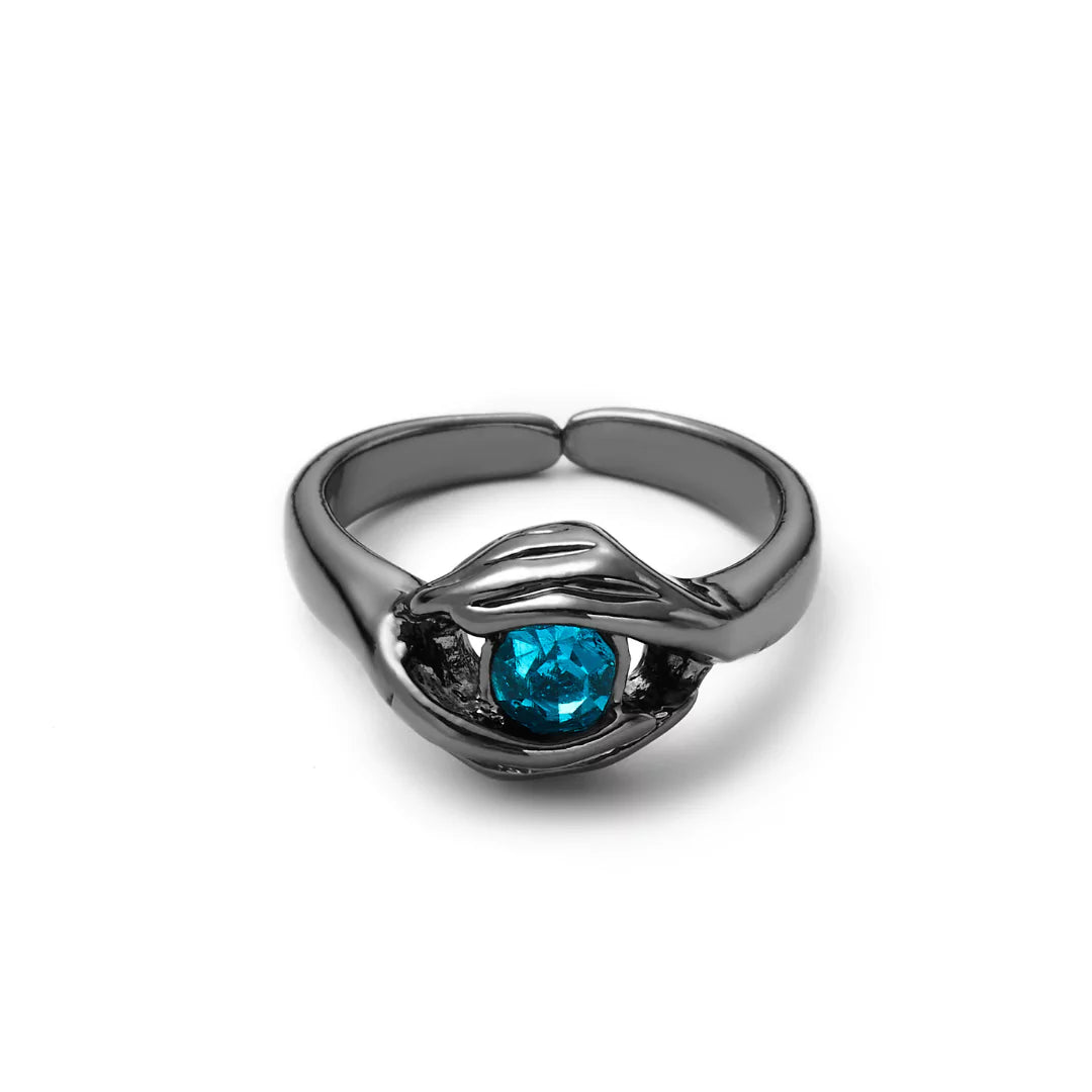 Schwarzer Ring mit leuchtend blauem Edelstein – Vorderansicht des Ewige Liebe-Rings von Swaravo