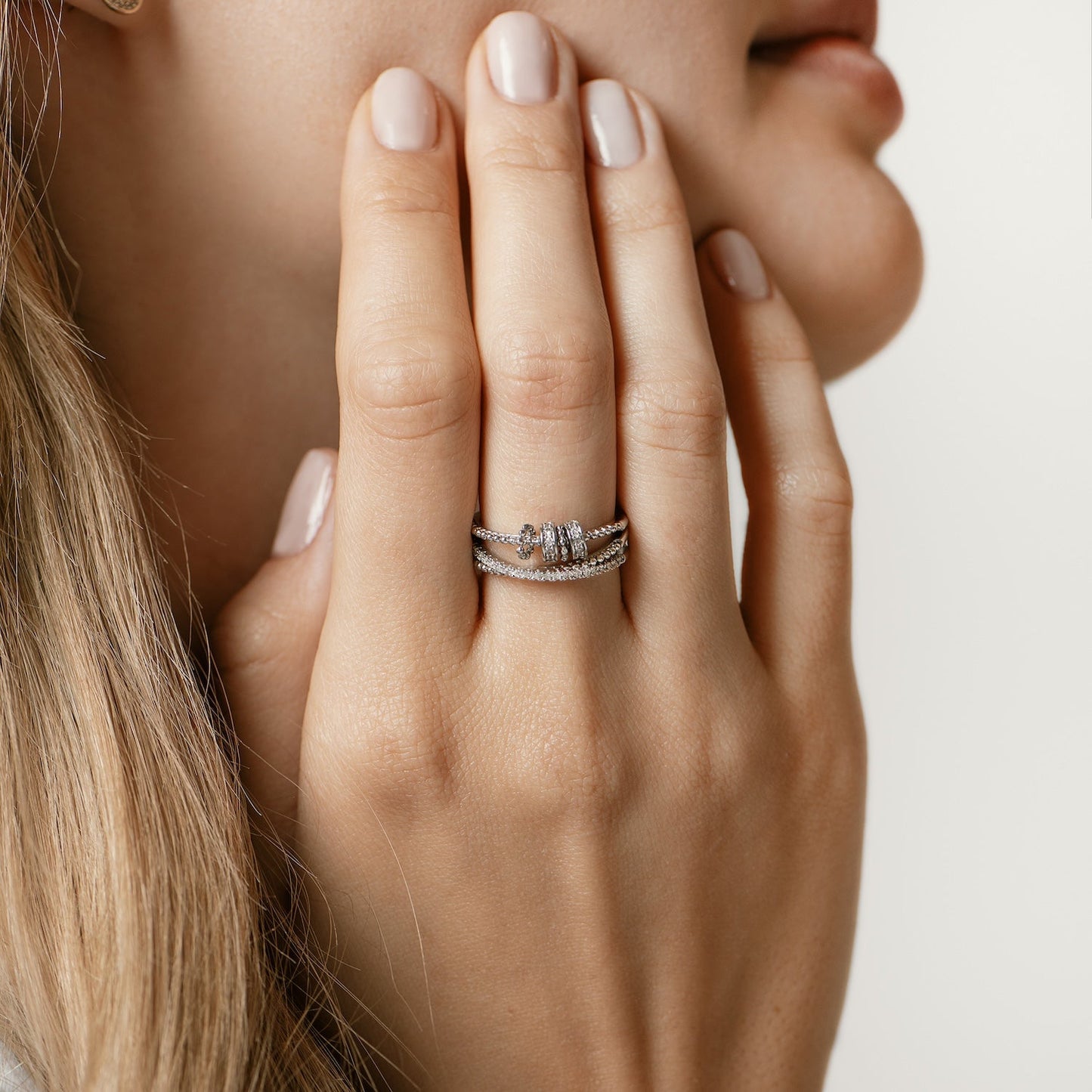 Ring aus S925 Silber mit vier rotierenden Mini-Ringen