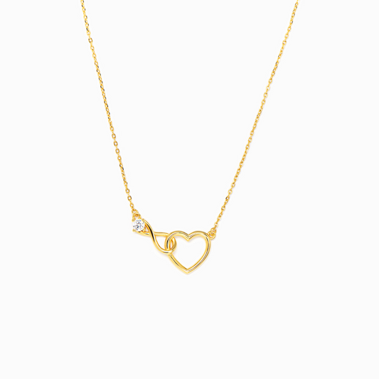 Goldene Herz-Kette mit „Eternity“-Symbolik – ein zartes Schmuckstück voller Bedeutung