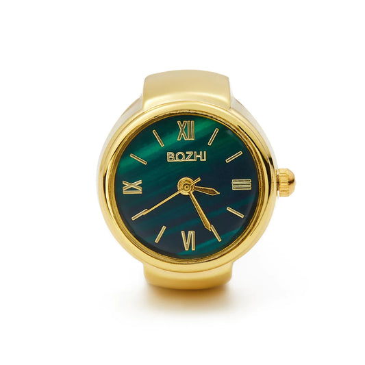Retro-Ringuhr von Swaravo mit goldener Oberfläche und Miniatur-Zifferblatt – elegantes Schmuckstück mit Funktion.